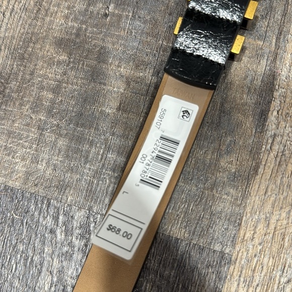 Gorgeous gold-tone hardware highlights this sleek belt from MICHAEL Michael Kors - Picture 6 of 10